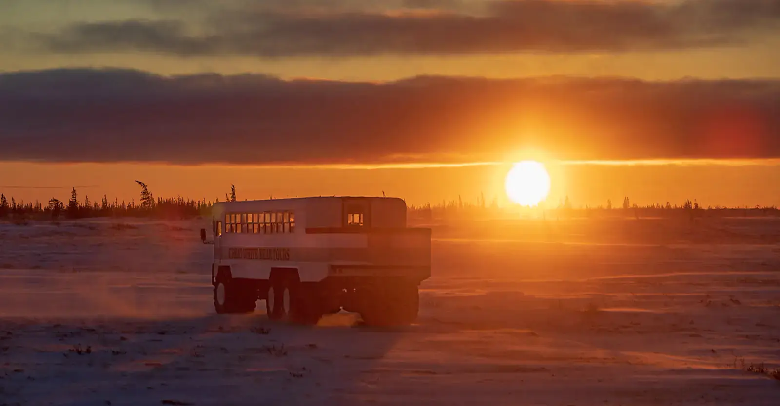Polar Rover crossing the tundra at sunrise, Churchill, Manitoba